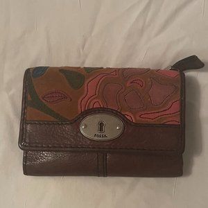 Brown, patterned fossil wallet with multiple compartments